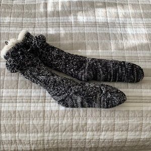 Express cable knit pom pom slipper socks